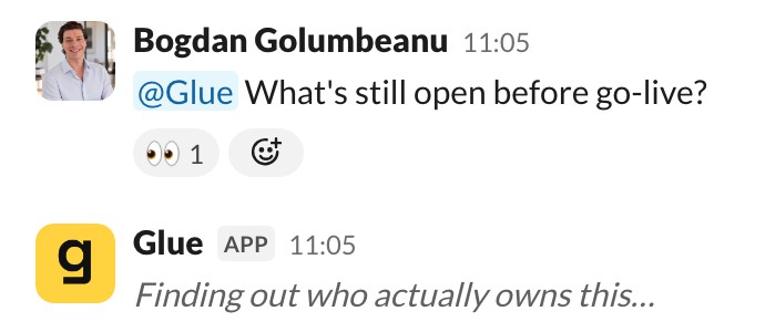 Bogdan asks @Glue what's still open before go-live. Glue shows an italic status line: Finding out who actually owns this…